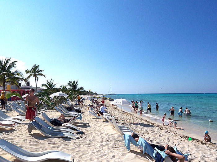Lounge chairs along Playa Mia Resort's beach on Cozumel.