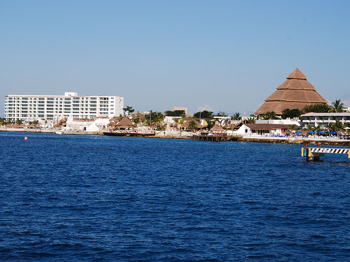 Buildings near the port seen from the ship as it leaves Cozumel.