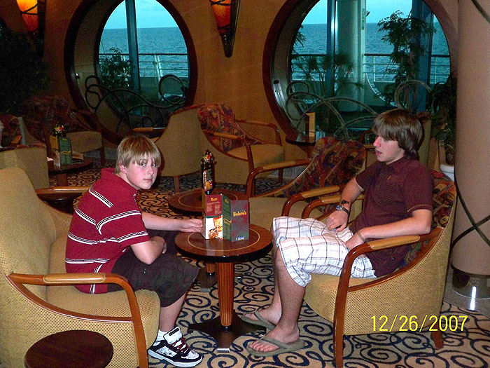 Greg and Ben relax in one of the ship's many lounges and discuss the upcomming Iowa Caucuses.