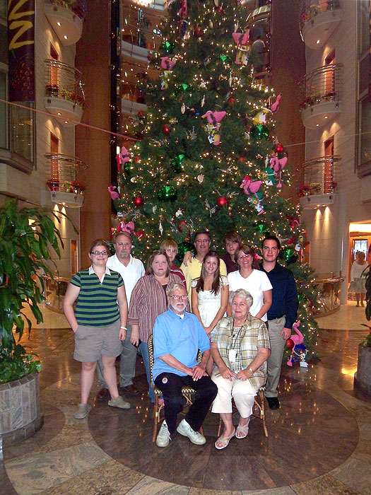 Our entire cruising party pauses for a Christmas photo in front of the ship's 10-story atrium.