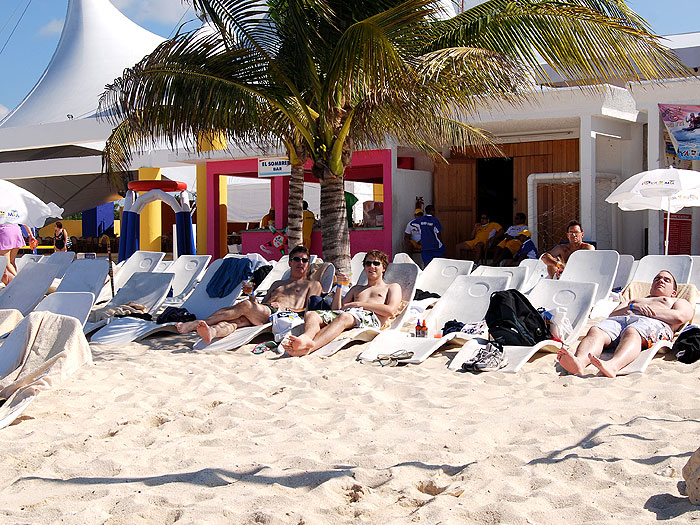 Dave and Ben on the beach soaking up the suds.