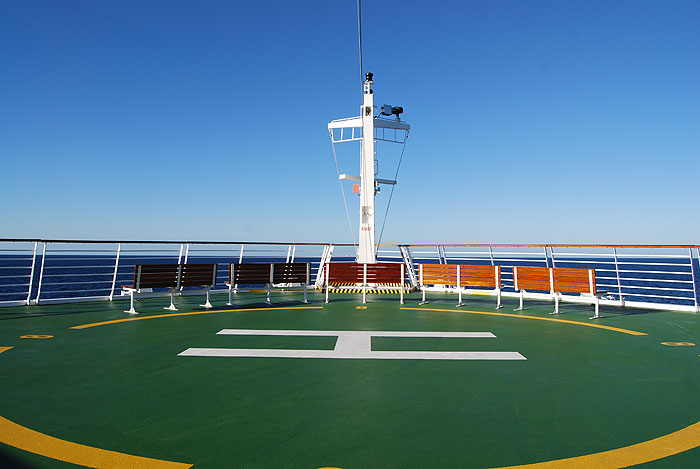 The helicopter pad in front of the ship's bridge.